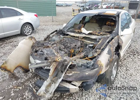 2001 Lincoln Continental из США, поврежденный, VIN 1LNHM97V81Y617612